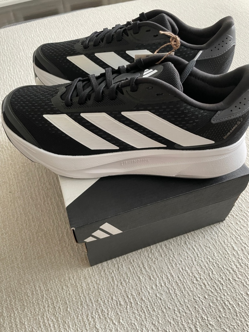 Adidas Black and White Athletic Sneakers